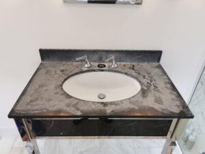 Restoration to Marble Vanity Top - Before